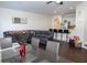 Open-concept living and dining area with modern furnishings and plenty of light at 82 Auburn Run Ln, Auburn, GA 30011