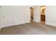 Bedroom with neutral carpeting and two doorways at 2280 Wildwood Lake Dr, Suwanee, GA 30024