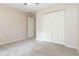 Bedroom features carpeting, closet, and two-panel doors at 2280 Wildwood Lake Dr, Suwanee, GA 30024
