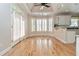 Charming breakfast nook with bay windows and hardwood floors at 2280 Wildwood Lake Dr, Suwanee, GA 30024