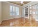 Bright dining room featuring plantation shutters and hardwood flooring at 2280 Wildwood Lake Dr, Suwanee, GA 30024