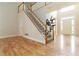 Grand foyer with hardwood floors, open staircase, and soaring ceilings, offering an inviting entrance at 2280 Wildwood Lake Dr, Suwanee, GA 30024