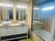 Elegant bathroom with double vanity, walk-in shower, and modern fixtures at 35 Creek Bend Trl, Oxford, GA 30054