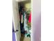 Organized closet with plenty of clothing, accessories, and storage racks at 35 Creek Bend Trl, Oxford, GA 30054