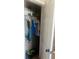 Organized closet with hanging clothes and shoes, maximizing storage space at 35 Creek Bend Trl, Oxford, GA 30054