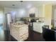 Well-equipped kitchen featuring white cabinets, stainless steel appliances, and granite countertops at 35 Creek Bend Trl, Oxford, GA 30054