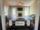 Bright living room showcasing a fireplace, neutral decor, and stylish furnishings at 35 Creek Bend Trl, Oxford, GA 30054
