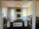 Cozy living room featuring a fireplace, lots of natural light, and comfortable seating at 35 Creek Bend Trl, Oxford, GA 30054