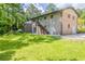 The backyard features a two-story exterior and a staircase at 4345 Kimball Sw Rd, Atlanta, GA 30331
