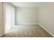 A spare room with carpet and sliding glass door at 4345 Kimball Sw Rd, Atlanta, GA 30331