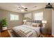 Staged bedroom with hardwood floors, stylish furniture, and lots of natural light at 4345 Kimball Sw Rd, Atlanta, GA 30331