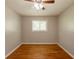 An empty bedroom showcasing hardwood floors, neutral walls, and natural light at 4345 Kimball Sw Rd, Atlanta, GA 30331