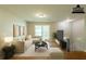 Staged living room with modern furniture, hardwood floors, and plenty of natural light at 4345 Kimball Sw Rd, Atlanta, GA 30331