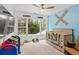 bedroom with blue walls and view of a forest at 4648 Equestrian Way, Atlanta, GA 30338