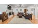 Cozy living room featuring hardwood floors, a fireplace, and stylish decor at 4648 Equestrian Way, Atlanta, GA 30338