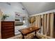 Open-concept bedroom suite with hardwood floors, and an attached dressing room/office at 4648 Equestrian Way, Atlanta, GA 30338
