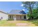 Backyard featuring a well-maintained lawn at 4695 Ravenwood Loop, Union City, GA 30291