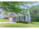 Beautiful home with a brick accent, manicured landscaping, and attached garage at 4695 Ravenwood Loop, Union City, GA 30291