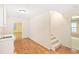 Finished basement area with hardwood floors, a sink, and staircase to the upper level at 4770 Powers Park Ne Ct, Marietta, GA 30067