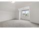 Bedroom with neutral carpeting, a large window, and neutral walls at 4770 Powers Park Ne Ct, Marietta, GA 30067