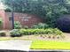 Powers Park community entrance with brick wall and flower garden at 4770 Powers Park Ne Ct, Marietta, GA 30067