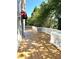Spacious deck with a white wood railing overlooks a beautiful wooded area offering privacy at 4770 Powers Park Ne Ct, Marietta, GA 30067