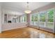 Elegant dining room boasts natural light, hardwood floors and ample space at 4770 Powers Park Ne Ct, Marietta, GA 30067