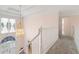 Bright two-story foyer with a decorative chandelier, stairs to the second story, and views of the front door at 4770 Powers Park Ne Ct, Marietta, GA 30067