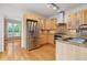 Bright kitchen featuring stainless steel appliances, granite countertops, and light wood cabinetry at 4770 Powers Park Ne Ct, Marietta, GA 30067