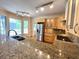 Spacious kitchen featuring granite countertops and stainless steel appliances at 4770 Powers Park Ne Ct, Marietta, GA 30067