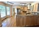 Well-lit kitchen with granite countertops, stainless steel appliances, and wooden cabinetry at 4770 Powers Park Ne Ct, Marietta, GA 30067
