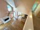 Open-concept living space with hardwood floors and a kitchen view from above at 4770 Powers Park Ne Ct, Marietta, GA 30067