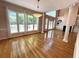 Open floor plan with hardwood floors, large windows, and stylish lighting fixtures at 4770 Powers Park Ne Ct, Marietta, GA 30067