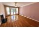 Cozy living room featuring a fireplace and access to an outdoor balcony at 4770 Powers Park Ne Ct, Marietta, GA 30067