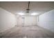 Unfinished basement with painted walls and overhead lighting at 6509 Charter Way, Lithonia, GA 30058