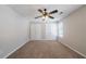 Bedroom featuring two closets and natural light from the window at 6509 Charter Way, Lithonia, GA 30058