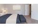 Bedroom showcasing a bed, bench, and stylish wall decor at , Lithonia, GA 30038