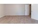 Cozy bedroom with neutral walls, soft carpet, and an open door to a closet at , Lithonia, GA 30038