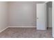 Bedroom featuring neutral walls, plush carpet, and open closet at , Lithonia, GA 30038