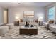 Staged living room featuring modern decor and lots of light at , Lithonia, GA 30038