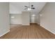 Spacious living room with modern light fixtures and beautiful floors at 1011 Riverclift Dr, Covington, GA 30016