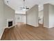 Spacious living room with fireplace, high ceilings and wood floors at 1011 Riverclift Dr, Covington, GA 30016
