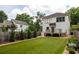 Rear exterior of home showing deck, level yard, and landscaping at 1354 Mcpherson Se Ave, Atlanta, GA 30316