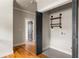 Hallway area with hardwood floors, modern doors, and access to storage and other rooms at 1354 Mcpherson Se Ave, Atlanta, GA 30316