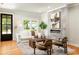 Bright living room with a modern fireplace, stylish decor, and hardwood floors for a cozy ambiance at 1354 Mcpherson Se Ave, Atlanta, GA 30316
