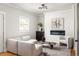 Inviting living room featuring neutral decor and a sleek fireplace at 1354 Mcpherson Se Ave, Atlanta, GA 30316