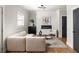 Cozy living area with a modern fireplace, neutral decor, and comfortable seating at 1354 Mcpherson Se Ave, Atlanta, GA 30316