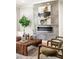 Comfortable living room showcasing a modern fireplace, plush seating, and inviting decor at 1354 Mcpherson Se Ave, Atlanta, GA 30316