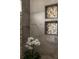 The detailed shower features stone accents, built in nooks, and an orchid at 1354 Mcpherson Se Ave, Atlanta, GA 30316