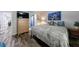 Bedroom featuring a flat-screen TV on dresser and ensuite bathroom at 1915 Cooper Landing Se Dr, Smyrna, GA 30080